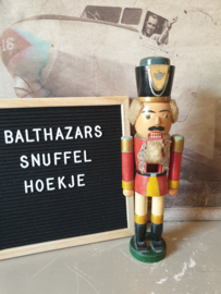 Oude houten notenkraker ertsgebergte