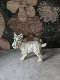 Wit gietijzeren deurstopper terrier hond
