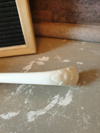 Oude witte soeplepel