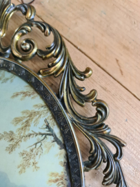 Oude koperen barok lijst met bolglas