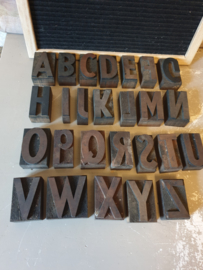 Oude houten letter alfabet stempels
