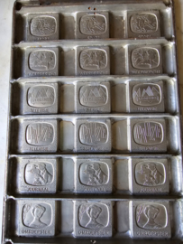 Oude metalen chocolademal televisie