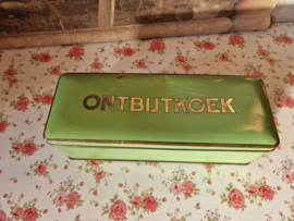 Oud groen blikken ontbijtkoek trommel