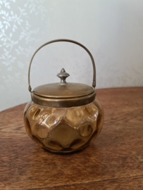 Oud geel glazen potje met deksel