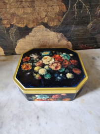 Oud blikken trommel floraal decor