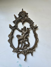 Messing ornament klok saturnus