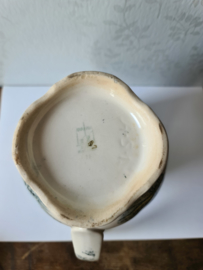 Oude brocante waterkan