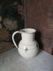Creme emaille waterkan art deco