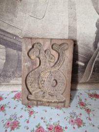 Oude houten koekplank draak