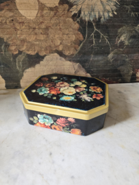 Oud blikken trommel floraal decor