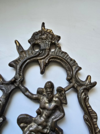 Messing ornament klok saturnus
