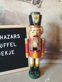 Oude houten notenkraker ertsgebergte
