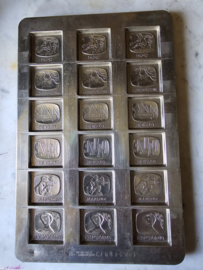 Oude metalen chocolademal televisie