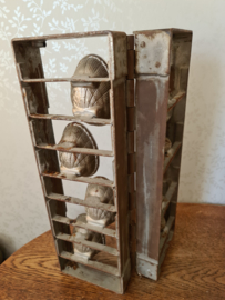 Antieke chocolademal kinderwagen