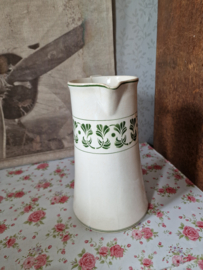 Oude beboterde kan art deco