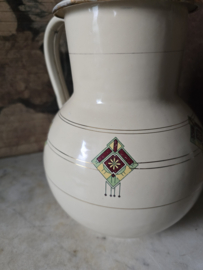 Creme emaille waterkan art deco