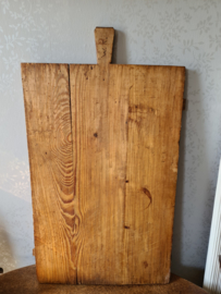 Oud doorleefd houten kaasplank serveerplank