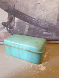 Oud doorleefd blauw groen trommeltje