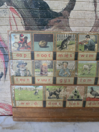 Oud leesplankje aap noot mies