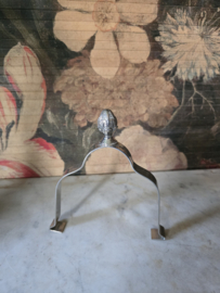 Verzilverde bordenklem