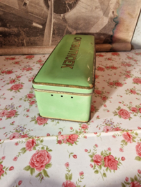 Oud groen blikken ontbijtkoek trommel