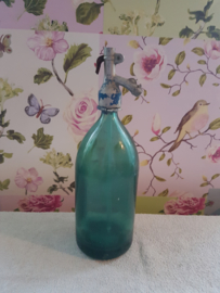 Oude blauw groen glazen spuitfles