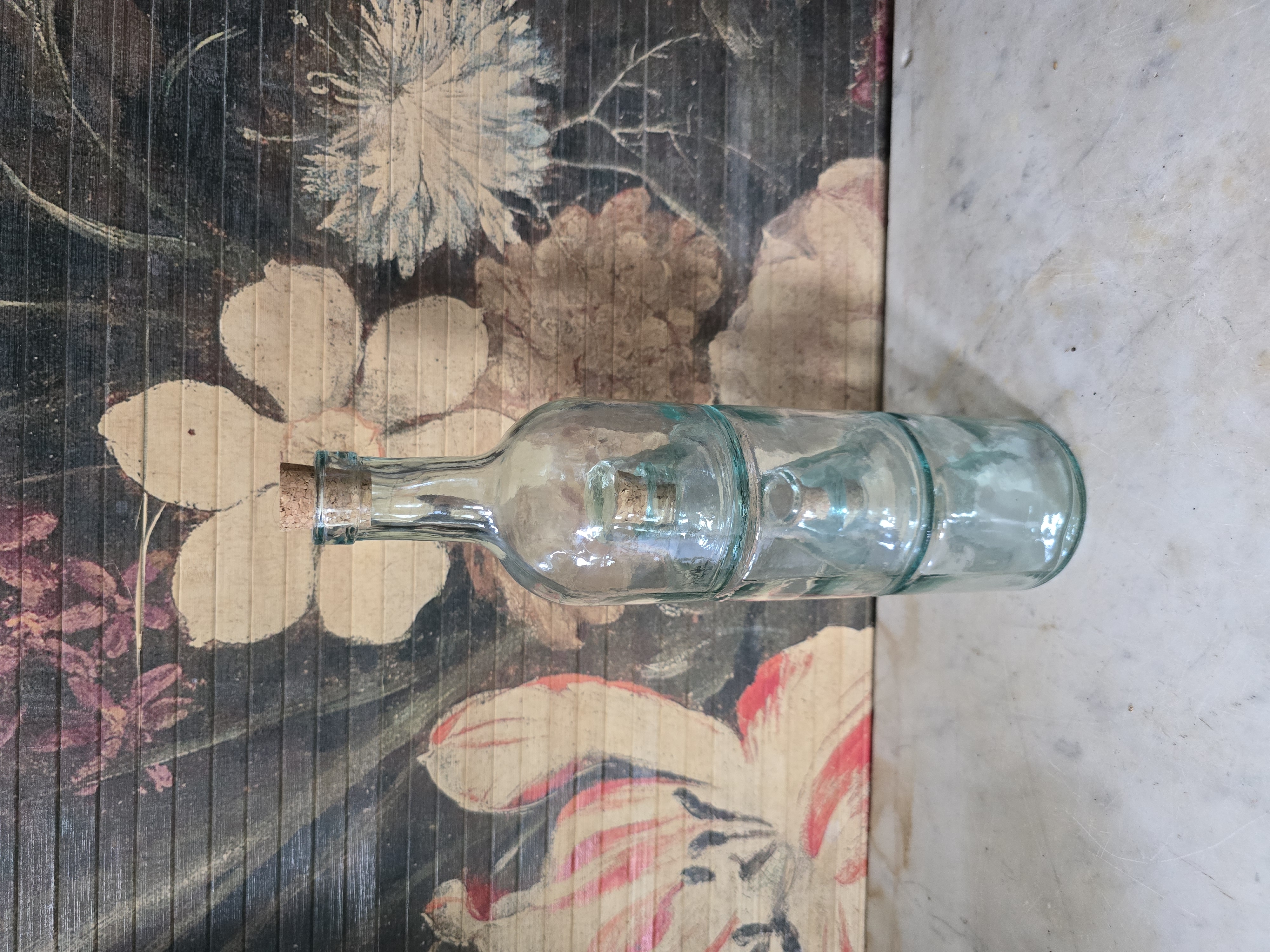 Blauw glazen stapelbare fles