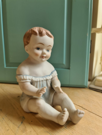 Oude porseleinen piano baby nr3