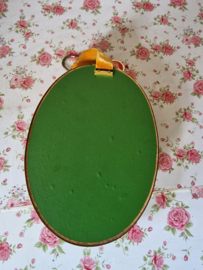 Oud droogbloemen boeket in bolglas lijst