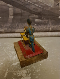 Oud blikken speelgoed houtzager