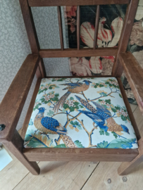 Oud eiken kinder stoeltje paradijsvogel