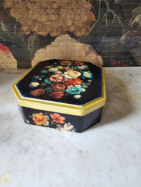 Oud blikken trommel floraal decor