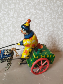 Antiek blikken speelgoed clown met zebra nr2