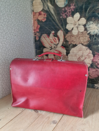 Oude rood leren schooltas