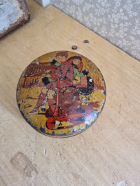 Oud blikje pette chocolade