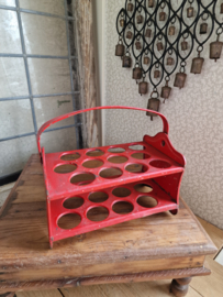 Oud rood blikken eierrekje