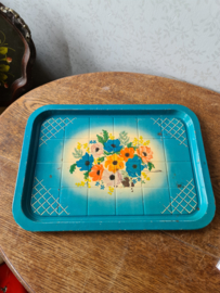 Oud blauw blikken dienblad bloemen
