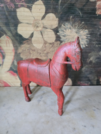 Oud rood houten paard