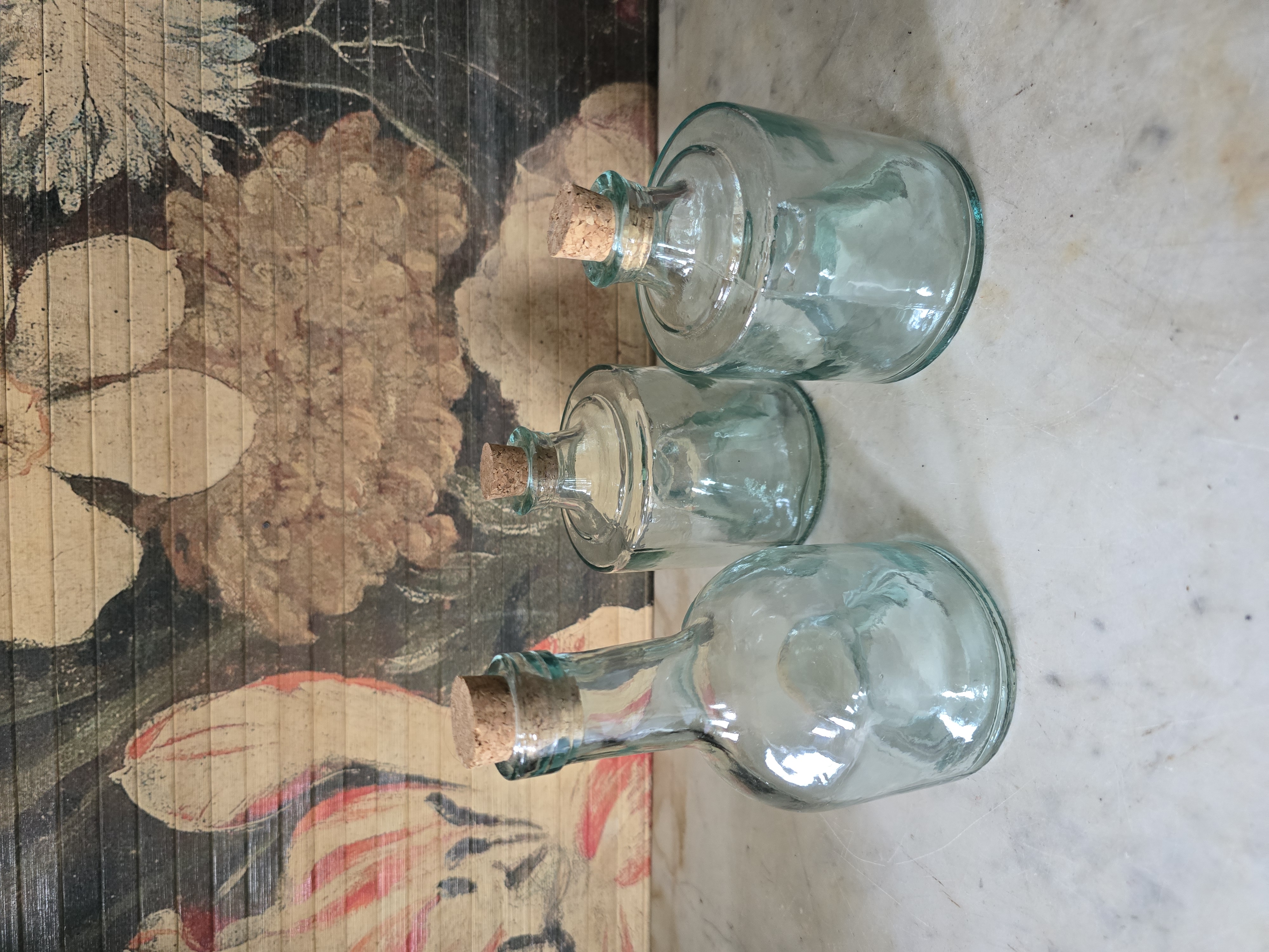 Blauw glazen stapelbare fles