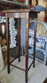 Oude houten plantentafel