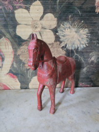 Oud rood houten paard