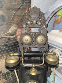 Antieke wandtelefoon