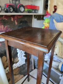 Oude houten plantentafel