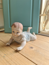 Oude porseleinen piano baby nr1
