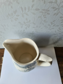 Oude brocante waterkan