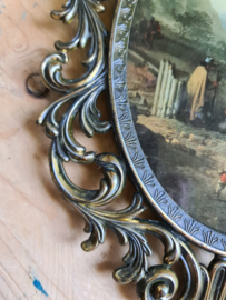 Oude koperen barok lijst met bolglas