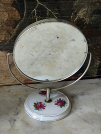 Oud tafel spiegeltje op porseleinen voet