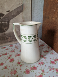 Oude beboterde kan art deco