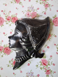 Zwart vintage keramieken hoofdje wand