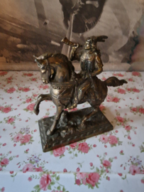 Antiek messing beeld hoornblazer te paard